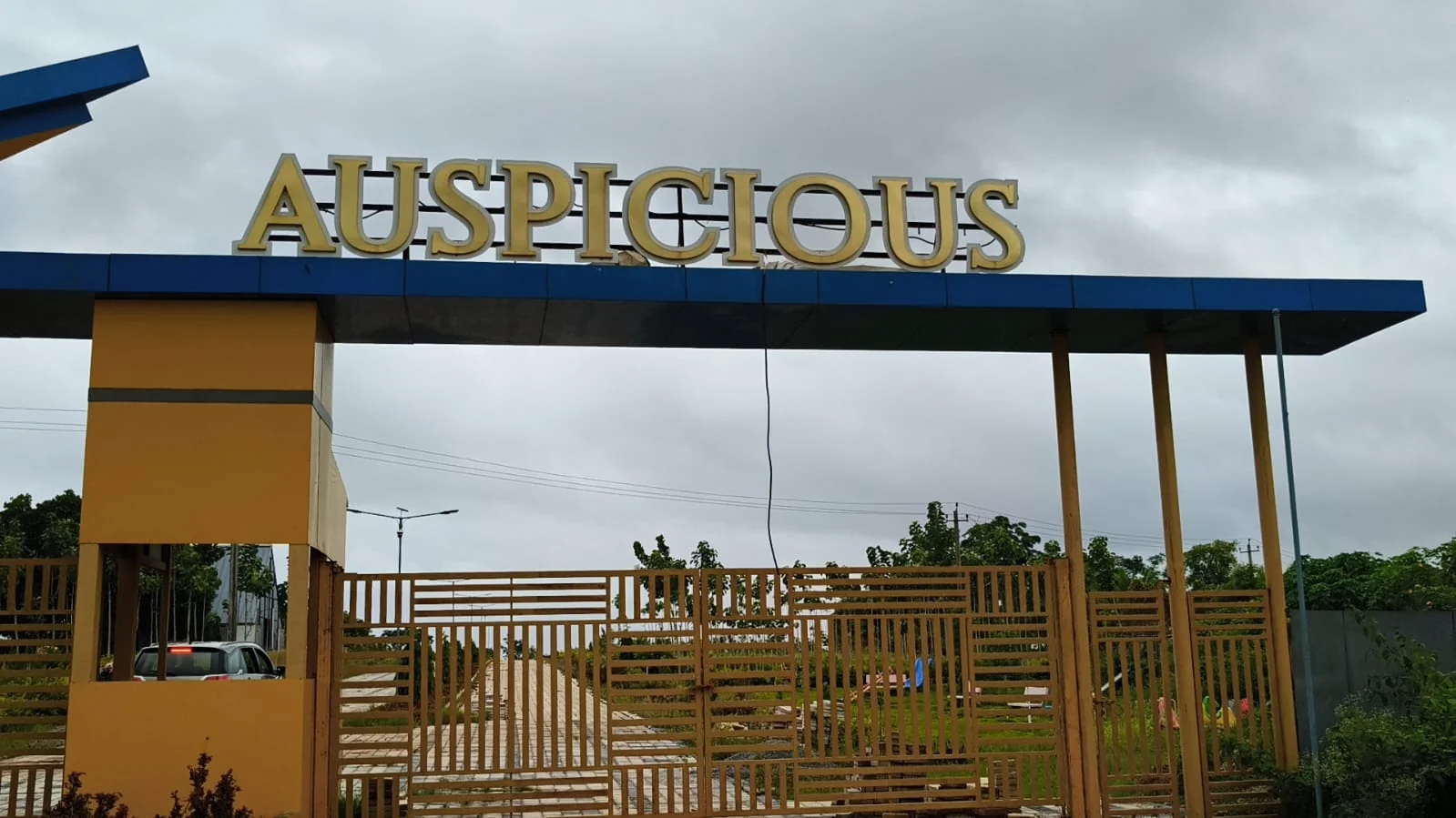 Auspicious project entrance signage — actual site photograph