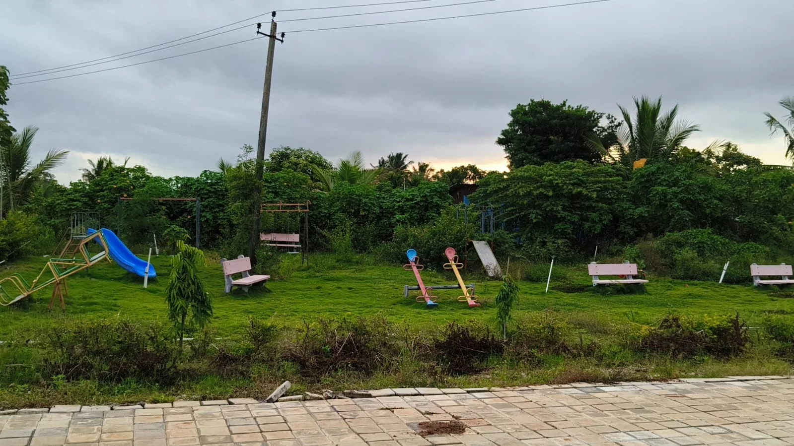 Outdoor play area and landscaped grounds — actual site photograph
